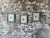 A charming set of երեք vintage framed prints inspired by traditional Indian miniature paintings, featuring stylized...