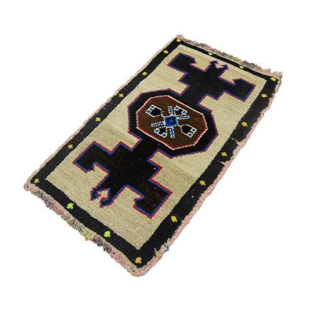 Vintage Handknotted decorative mini rug from Kars region of Turkey. Approximately 45-55 years old. In very good condition.