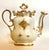 19th Century Rococo coffeepot in style of Meissen or Limoges. Unbelievable condition for its age. The gold gild is...