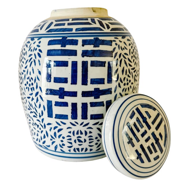 A beautiful old Chinese blue and white ginger jar featuring the very popular double happiness symbols. Large double...