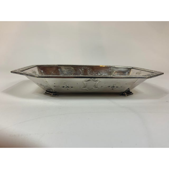 Vintage silver plate footed serving dish. No mark, unsigned. Measures 11.5" wide x 8.75" deep x 2" high
