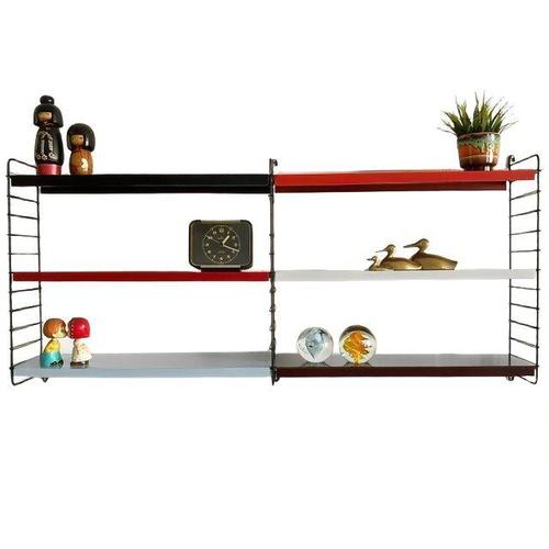 Vintage mid-century Modernist modular wall rack made of metal with multicolor metal shelves from the 1950s. The...