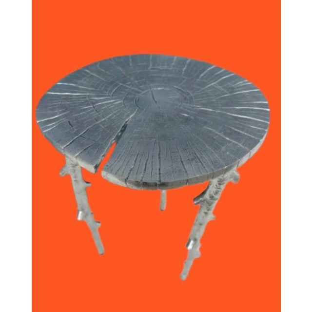 Gorgeous little art table from acclaimed American designer Michael Aram. The perfect accent table pewter style never...