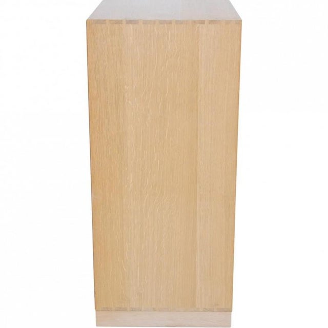 Mogens Koch deep bookcase made of oak. The bookcase is from the 1980s and appears in good condition with a few marks and...