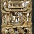 This Chinese carved wood panel from the first half of the 20th century features a cavalry, musicians and building motif....