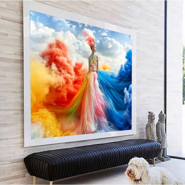 A surreal picture of a woman in a colorful tulle dress standing among the clouds. Printed on 300gsm Fine Art Paper.