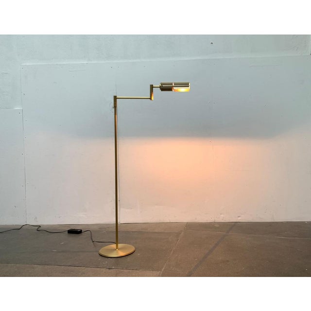 Halo profile floor lamp from Swisslamps in a rare color. The design dates from the 1970s. The floor lamp draws its...