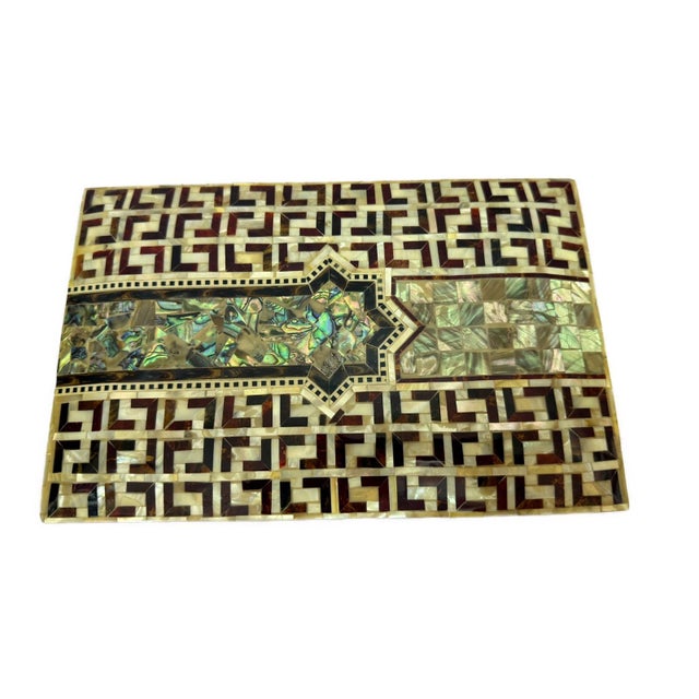 Bring timeless Egyptian craftsmanship into your home with this handmade wooden jewelry box featuring an elegant mother of...