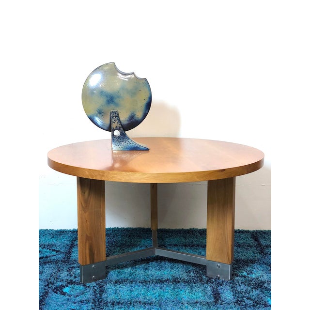 1960s Modernist Table. The table is of Italian manufacture from the 1960s, made of solid wood with a beech top and satin-...