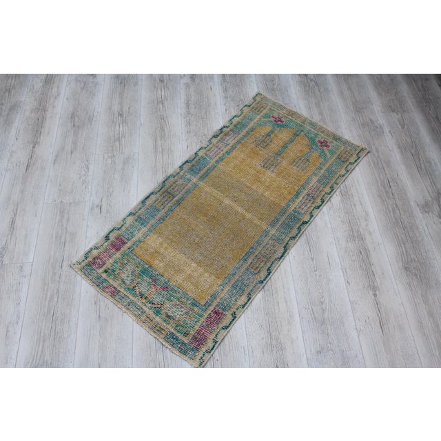 This beautiful, traditional vintage, handwoven Turkish rug is approximately 60 years old. It is handmade of very fine...