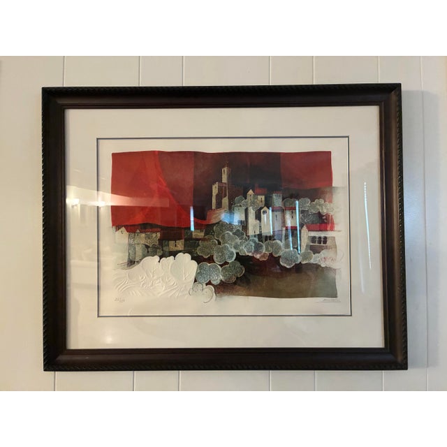 Paisaijo by Àlvar Suñol is a signed limited-edition lithograph (22/125) that captures a serene, stylized scene of everyday...