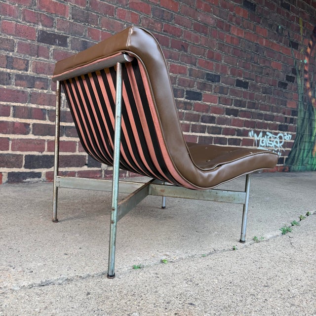 Laverne lounge chair designed by Ross Littell C.1952. Original leather cushion and chrome plated frame.