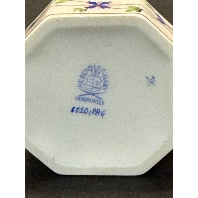 The Vintage Herend Blue Garland Bunny Rabbit Porcelain Hand Painted Trinket Box 6020 is a beautifully crafted decorative...