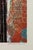 A color serigraph depicting a classical column rendered in dark tones set against a layered red and multicolored ground....