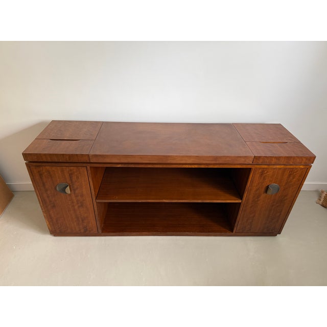 Bill Sofield for Baker Credenza du Cap. Walnut wood and finish, leather inset top, antique brass hardware. Single...