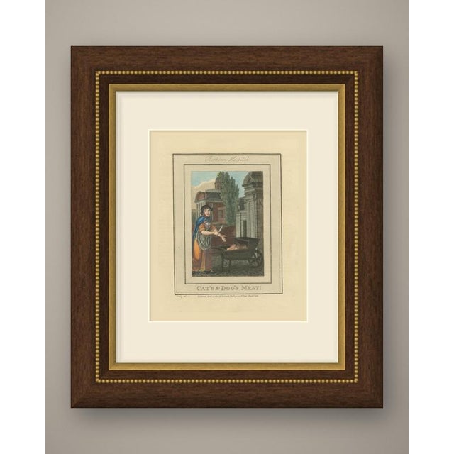 An original antique hand colored copper engraving of a london street seller, lettered "cat's & dog's meat!" below the...