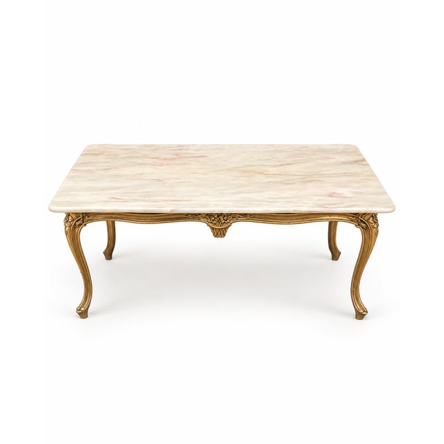 Louis XV style coffee table in gilt bronze with a white marble top, dating from the 1960s-70s. Dimensions: height 47 cm,...