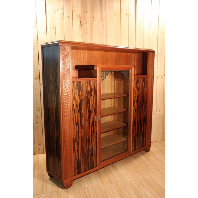 Bookcase signed by Gauthier Poinsignon Nancy, Art Deco period, mahogany and Macassar veneer and wrought iron, in very good...