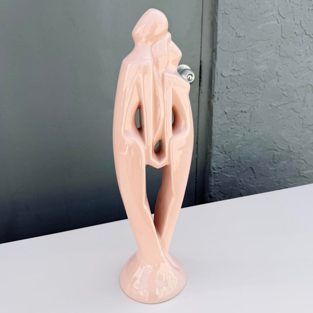 Striking 1980s Royal Haeger “Lovers” ceramic sculpture featuring an elegant abstract depiction of an embracing couple....