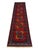 This wool runner features six colorful geometric medallions against a rich red field. Turquoise blue, green, and golden...