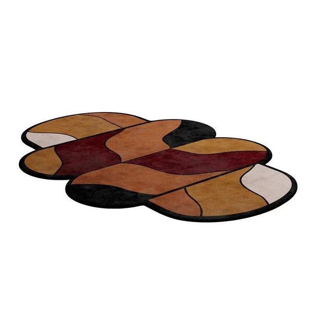 Tapis Shaped 025 is an eclectic rug that brings back mid-century modern vibes. Our Shaped Collection is perfect for an...