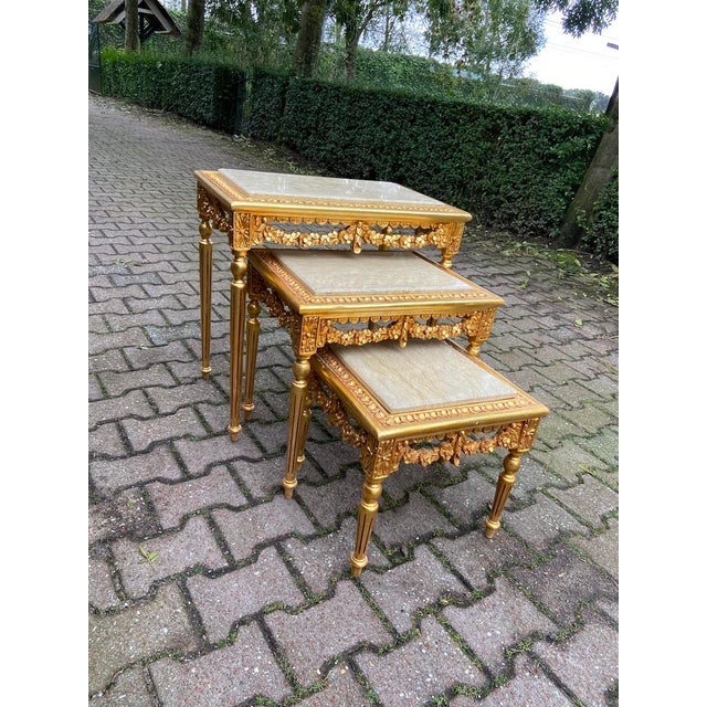 Set of 3 French Louis XVI Gilded Beech Side Tables with Beige Marble Tops – 3 Pieces Add timeless elegance and versatility...