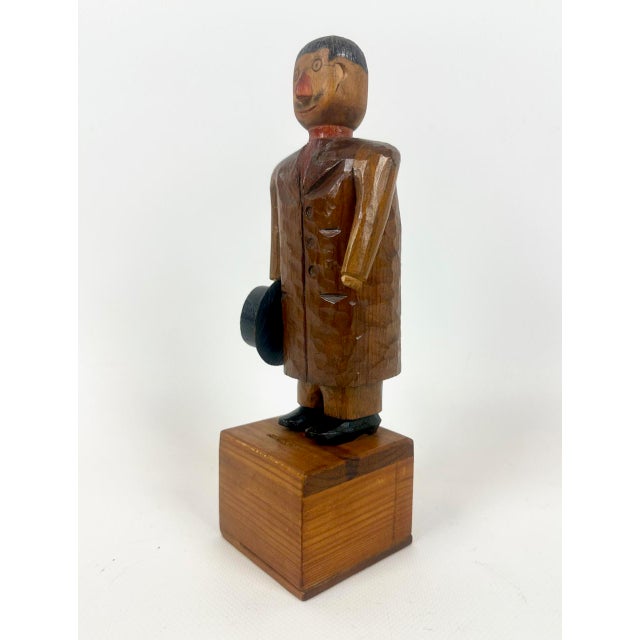 Swedish Wooden Hand Carved Man with Hat Sculpture with Money Box, 1910s, in Very Good conditions. Designed 1890 to 1919