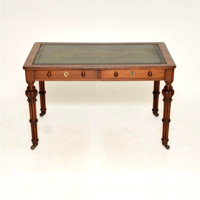 A superb antique William IV walnut partners writing table / desk. This was made in England, it dates from around the...