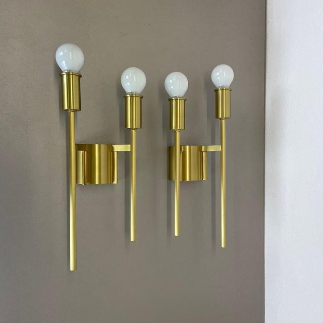 Article: Wall light, set of 2 Origin: Italy in the manner of Stilnovo, Gio Ponti Age: 1970s This modernist light set was...