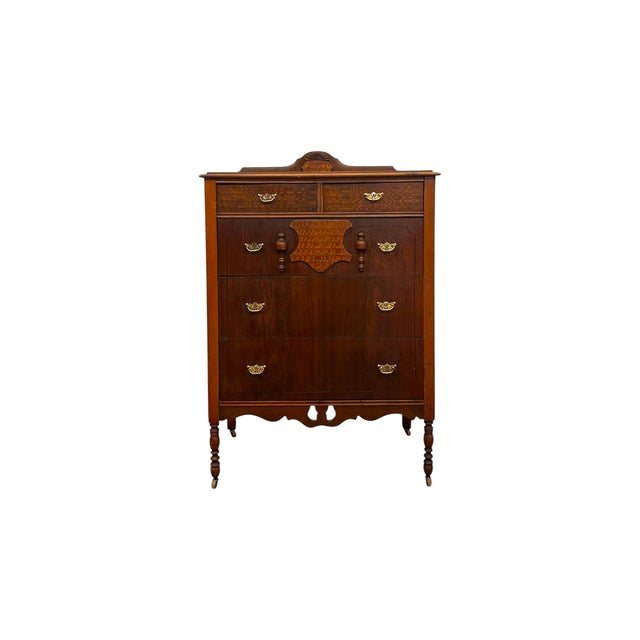 Bring timeless historic charm into your home with this exquisite antique vintage chest of drawers, meticulously designed...