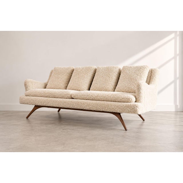 This exceptional vintage Vladimir Kagan Venetian Sofa, circa 1950s, is a striking example of Kagan’s sculptural approach...