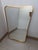Mirror with Sinuous Brass Frame by Gio Ponti for Gubi, 1990s, in Very Good conditions. Designed 1990 to 1999 I have...