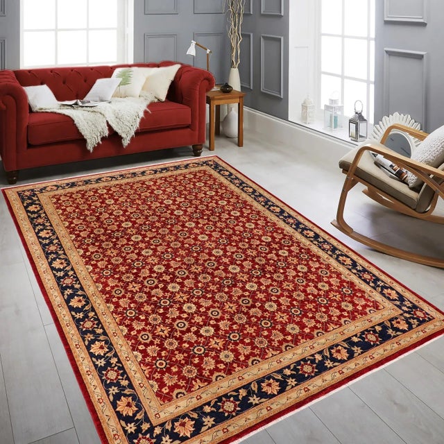 "Enhance the ambiance of your home with this magnificent Persian-influenced Turkish hand-knotted rug made by skilled...