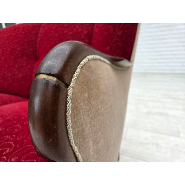 1950s, Danish 3-seater sofa. Original red/beige furniture wool and beige furniture velour. Beech wood legs with brass...