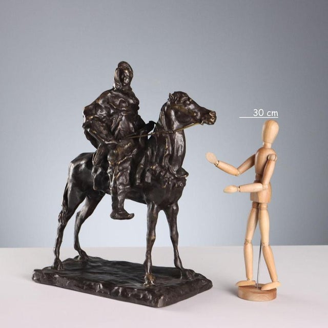 Bronze sculpture depicting a Berber on horseback. Signature of the author engraved on the base. This piece is attributed...