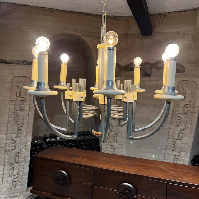 For your consideration, 1940s Art Deco Eight Arm Chandelier Bakelite and Chrome White Bakelite on Chrome-plated Tubular...