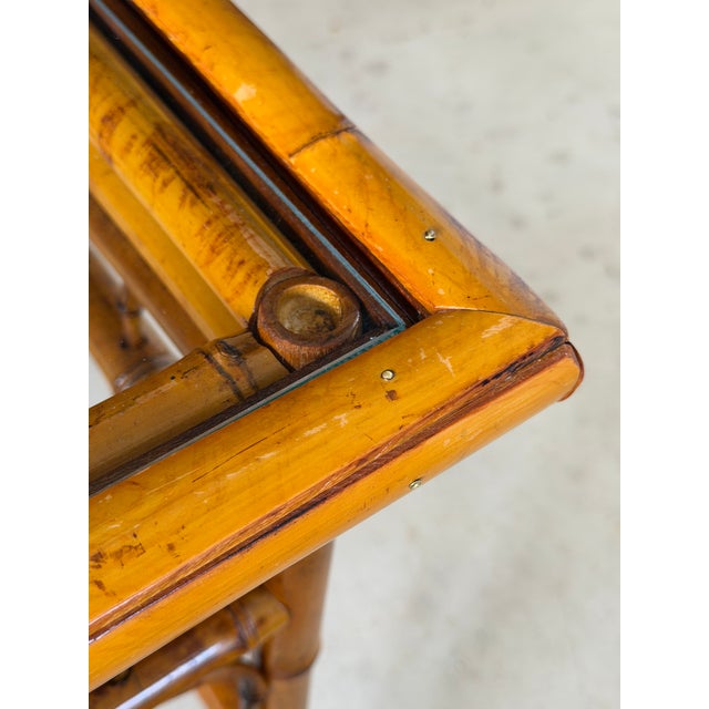 Timeless coastal style with the unmistakable influence of Brighton Pavilion. This pair of vintage bamboo side tables has...
