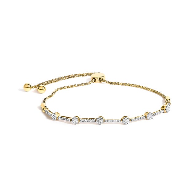 Unveil the essence of refined elegance with this exquisite bracelet, masterfully crafted with a delicate gold chain that...