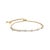 Unveil the essence of refined elegance with this exquisite bracelet, masterfully crafted with a delicate gold chain that...