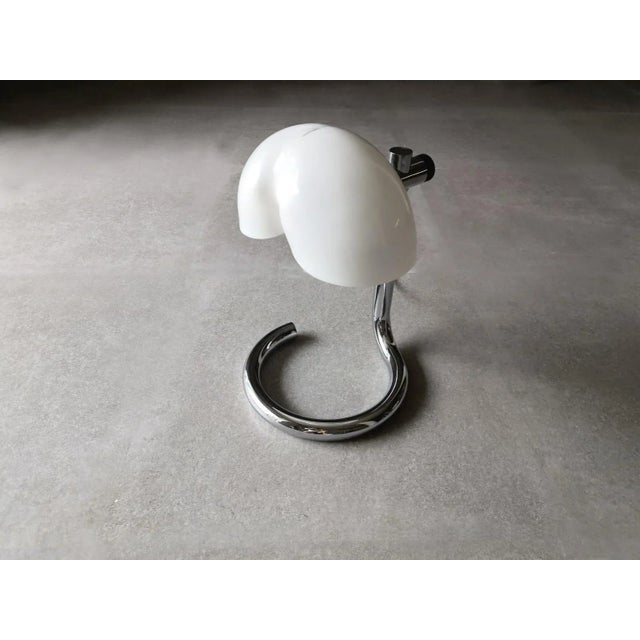 Spectacular chrome table lamp by Matalarte curved tubular screen height adjustable. This piece is attributed to the...