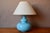 This table lamp is a beautiful retro piece, both elegant and bohemian. It features a colorful, glossy ceramic base. In a...