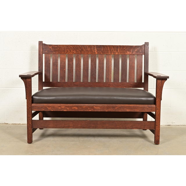 An exceptional antique Mission or Arts & Crafts period bench, settle sofa, settee, or love seat By L. & J.G. Stickley USA,...