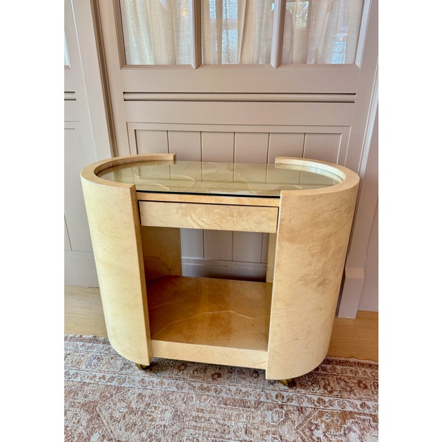 Aldo Tura (1909-1963) was an Italian furniture craftsman. In the 1930s, be began his work creating intricate furniture...