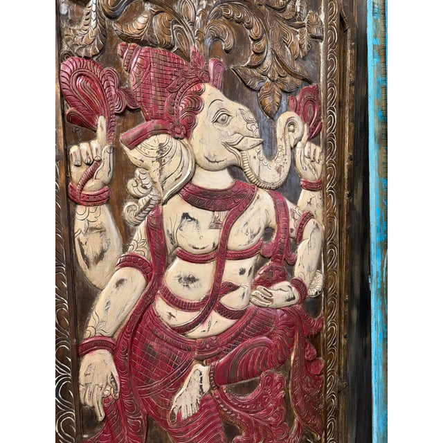 Radiating peace, prosperity, and protection, this vintage carved wooden door panel features a beautifully detailed...