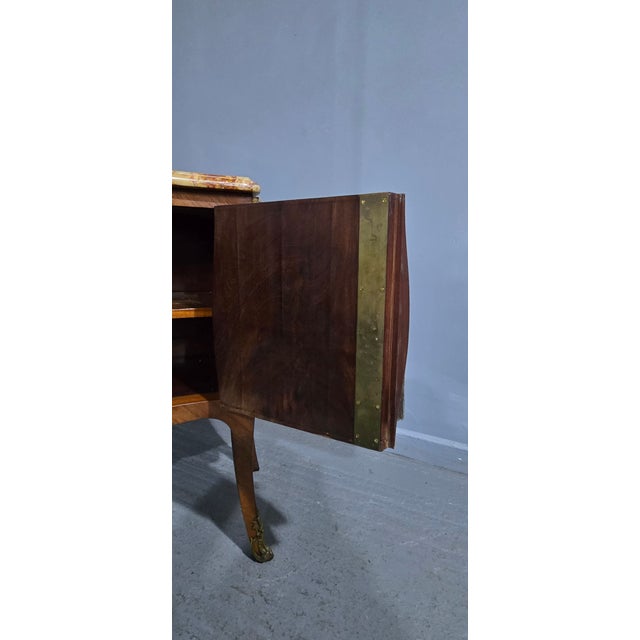 Superb Two door bombe shaped cabinet, with segmented front and sides, made from satinwood, ormolu mounts and lovely...