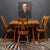 ABOUT Authentic 1930s "Colonist Craft" dining set manufactured by the renowned Sikes Company. This dining set bridges...