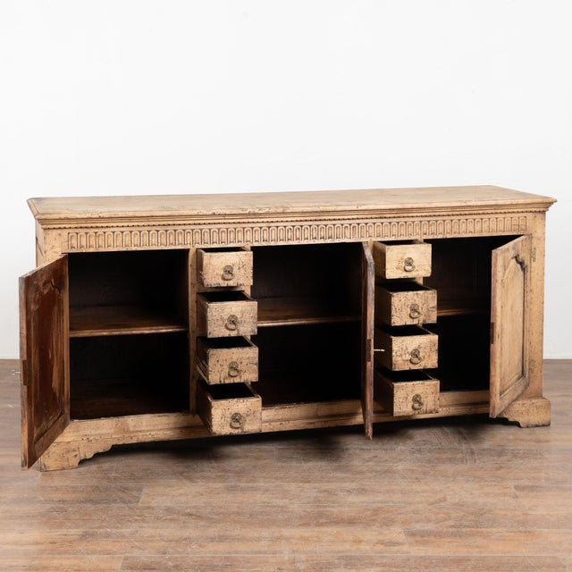 19th century French sideboard, crafted in oak and bleached to create a lighter finish (with darker sections throughout)...