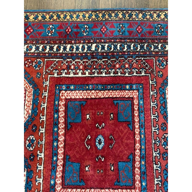 Handsome jewel tone wood Turkish rug having geometric pattern in deep red, blue & white. (Patten)