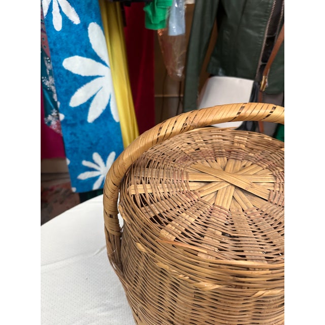 Up for consideration is a beautiful vintage large handmade wicker basket and a matching lid. This would look lovely on...
