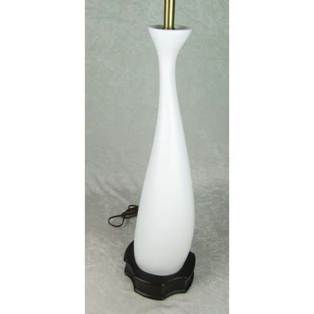 Vintage Mid Century Modern pottery lamp by Antonia Campi for S.C.I Laveno, Italy. The lamp is a matte white with...